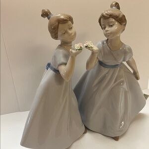 NADAL Porcelain Figurines. Two girls with flowers Over 25 years old.